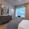 Spacious bedroom with large windows