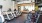 Large fitness center with cardio and weight lifting equipment.